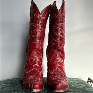 Red Heeled Boots with Intricate Stitching